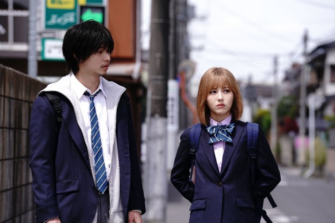 Ayaka (Minami Hamabe) and Kurou walk home from school, their connection growing.